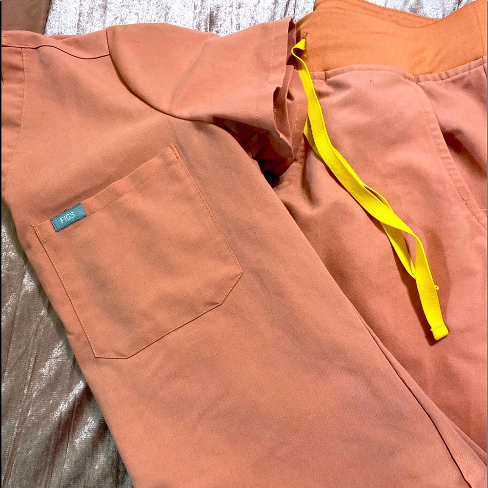 Figs Scrubs, I can’t remember the name of the color,pink with orange drawstring